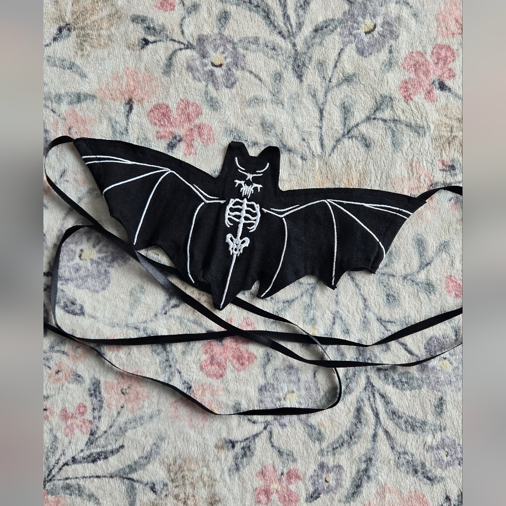 Dolls Kill spooky skeleton bat face mask